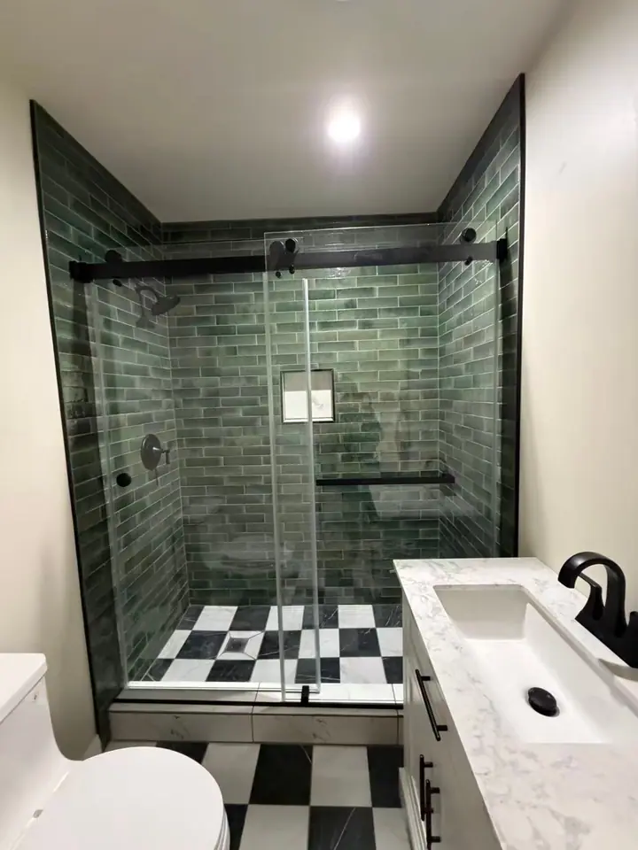 Extra-wide double sliding door in matte black installed by Merlord