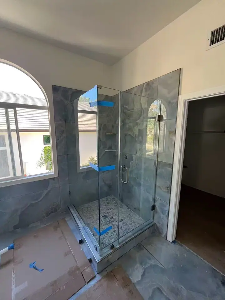 Hinged enclosure beside a window installed by Merlord